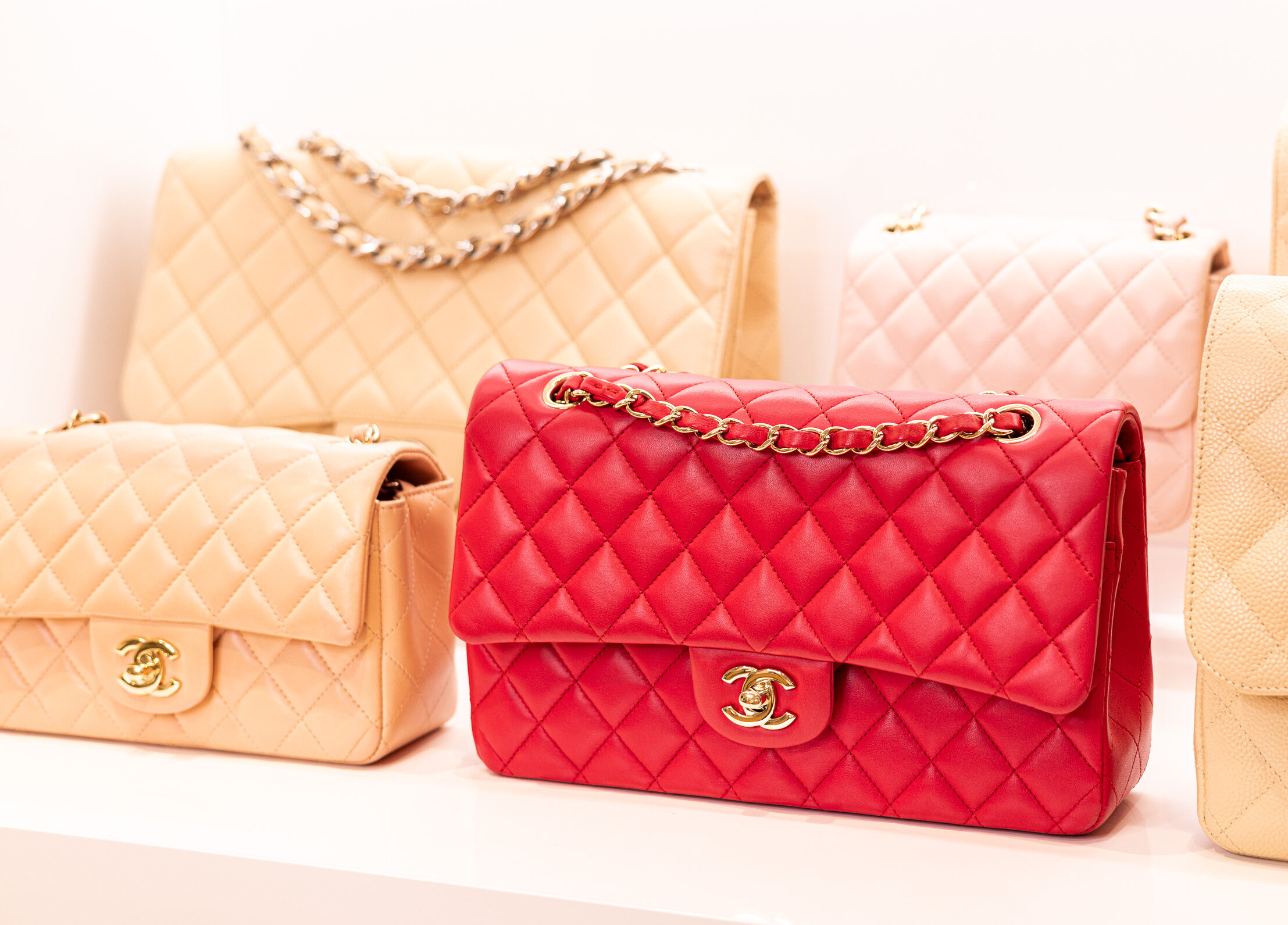 Investing in Iconic Fashion: Chanel's Large Colorful Flap Bag with Vintage Gold Accents